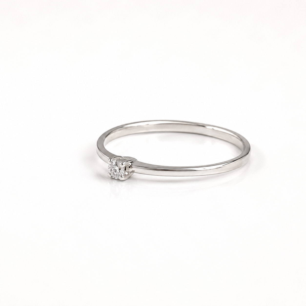 Anello Solitario in Oro Bianco 9kt con Zircone Bianco
