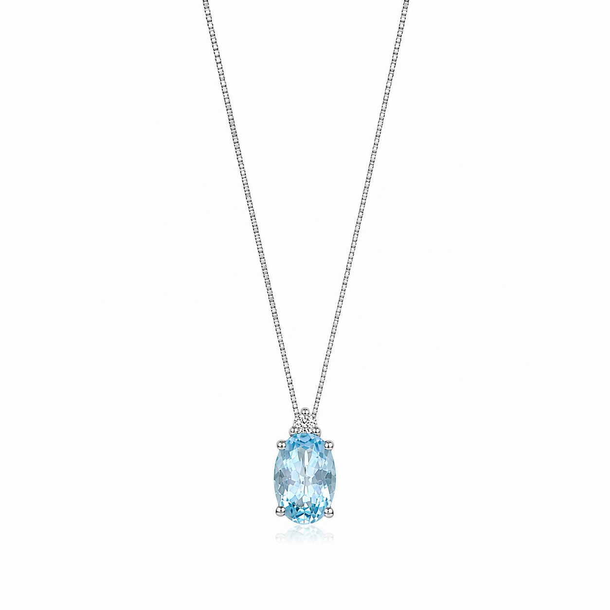 Collana in Oro Bianco 9K con Pietra Zircone Azzurra Ovale e Punto Luce Cubic Zirconia