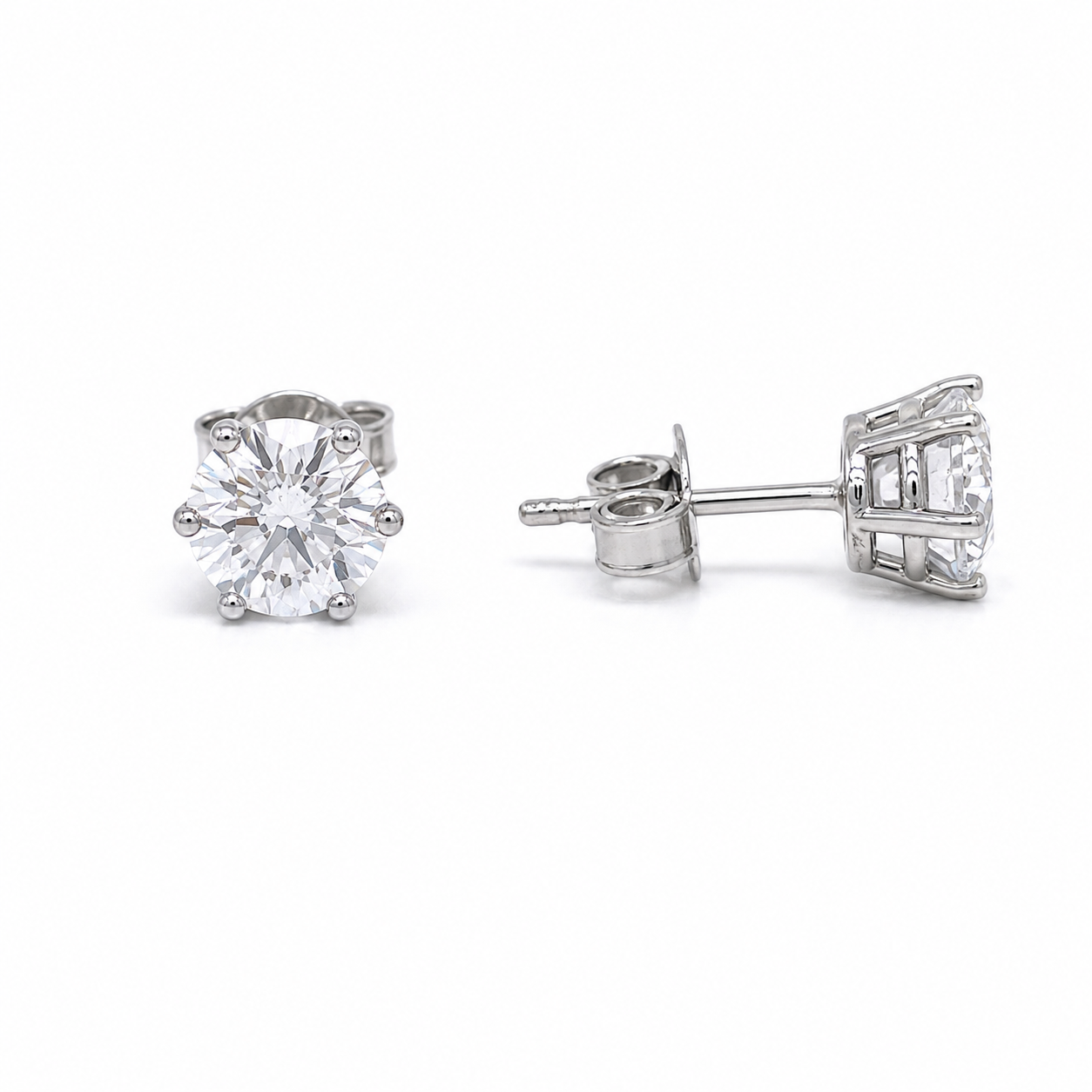 Orecchini Punto Luce in Oro Bianco con Zircone Bianco