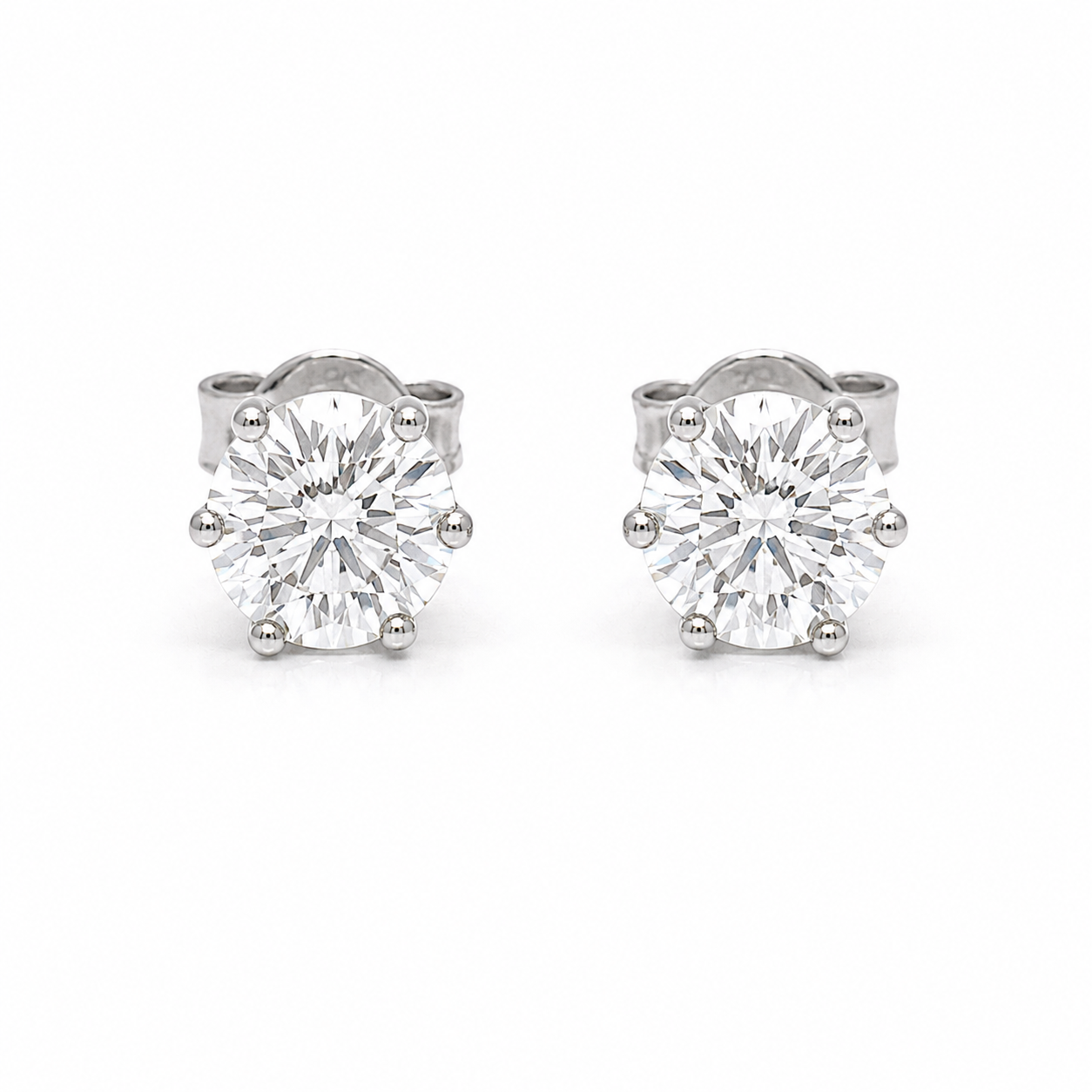 Orecchini Punto Luce in Oro Bianco con Zircone Bianco