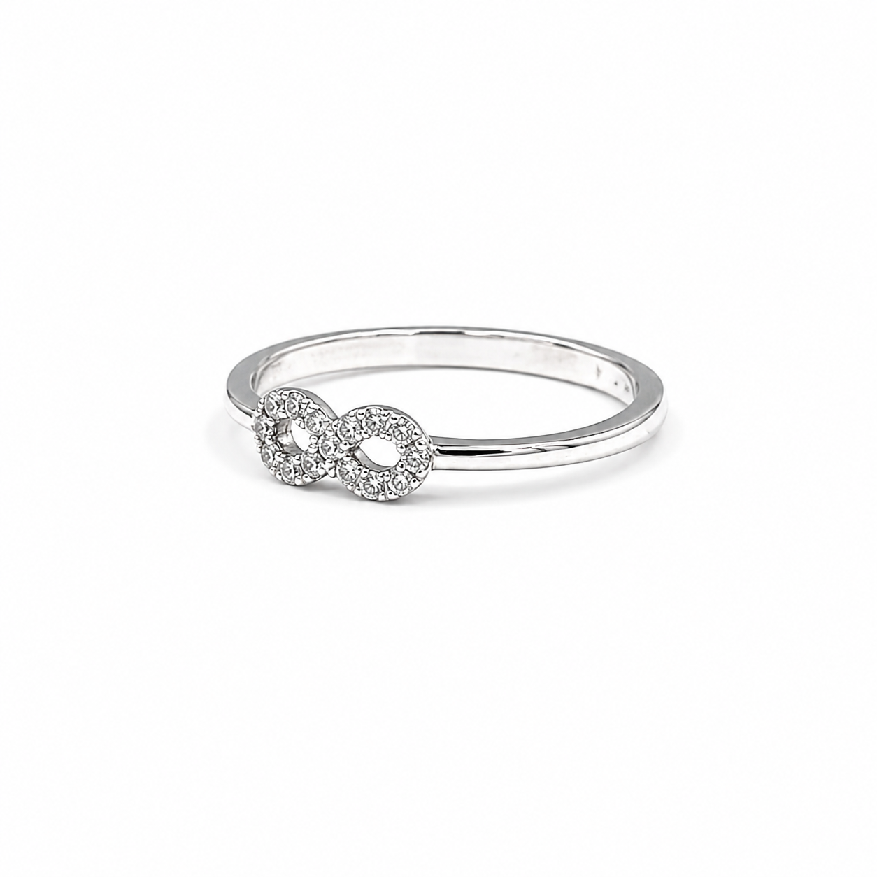 Anello Infinito in Oro Bianco 9kt con Zirconi Bianchi