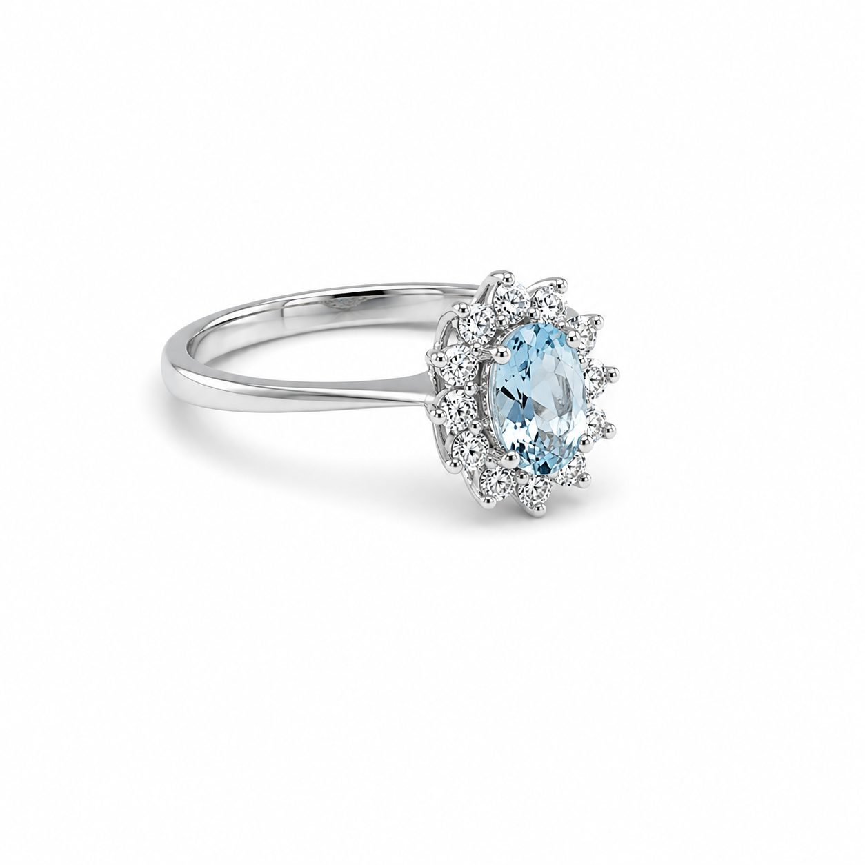 Anello in Oro Bianco 9KT con Zircone Azzurro e Zirconi Bianchi