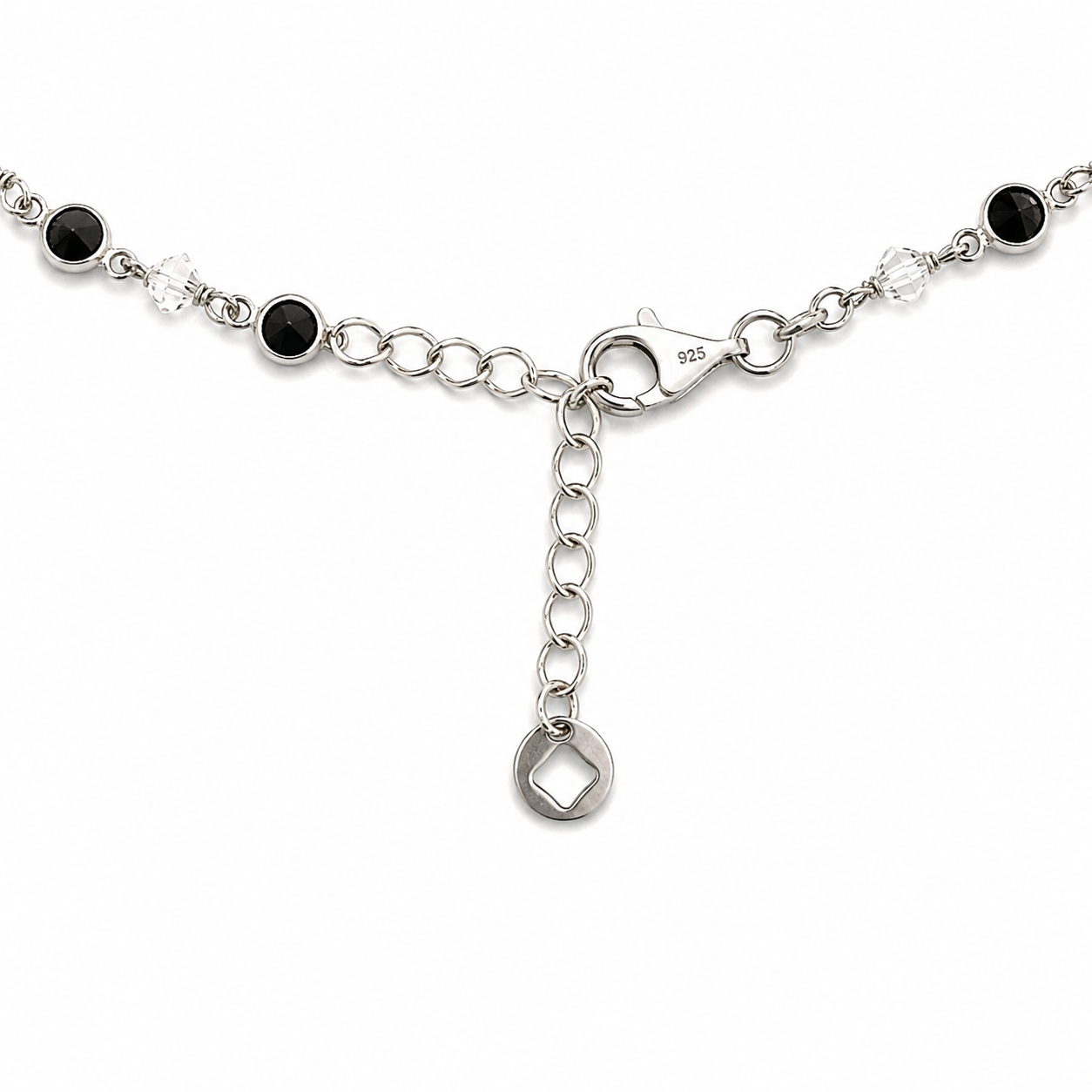 Bracciale con Zirconi Neri  e Perline Bianche in Argento
