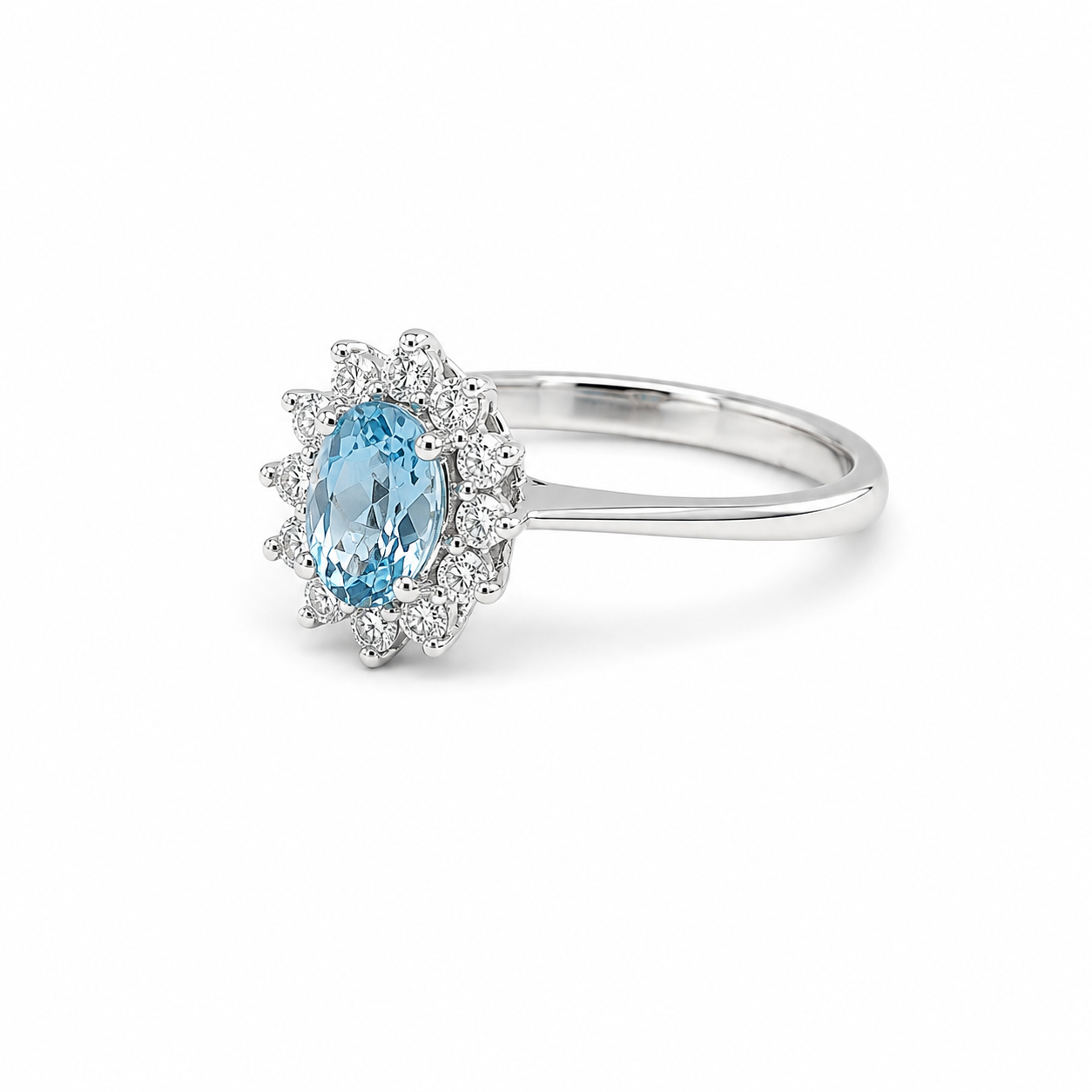 Anello in Oro Bianco 9KT con Zircone Azzurro e Zirconi Bianchi